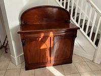 Front angled view of sideboard with doors closed