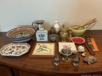 Full view of all items in the lot displayed on wood surface