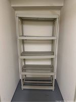 Front view showing five shelves and overall unit height and width.