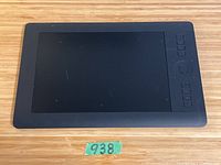 Top-down image of Wacom pen tablet showing full device and function buttons.