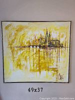 Front view of the framed abstract cityscape painting signed by Clare, showing the 49x37 inch measurements under the artwork. Dominant warm yellow and white with city skyline and bridge in brown and black.