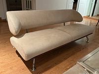 Front right three-quarter view showing seating surface and backrest