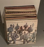 Stack of LP records with front cover 'Rahsaan Roland Kirk - Other Folks Music'