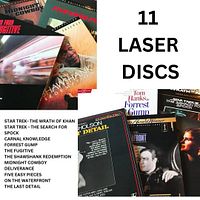 Multiple LaserDisc covers and jackets showing titles included in the lot