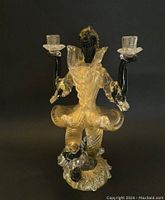Angled front view showing full clown figure and candle cups