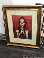 Framed artwork showing the subject and overall presentation of the lithograph.