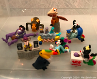 All small cartoon character figurines on display