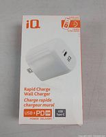 Front view of the retail packaging showing white IQ Rapid Charge Wall Charger with USB PD 35W and USB Type-C port logos.