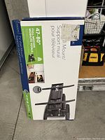 Photo of the boxed Mainstays full motion TV wall mount support for TVs 47-80 inches