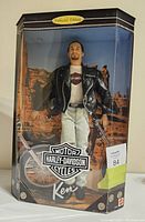 Full view of the Ken doll in original Collector Edition box with desert and motorcycle background, showing the front view.
