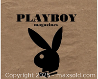 Photo of a paper box labeled Playboy magazines with the iconic Playboy bunny logo