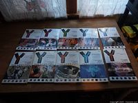 Front covers of all 10 graphic novels laid out in two rows showing artwork and volume titles.