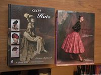 Front covers of two hardcover books: "1000 Hats" by Norma Shephard with photos of vintage hats, and "Vintage Fashion" showing a woman modeling vintage clothing.
