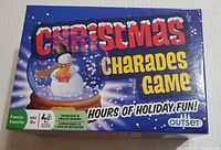 Front of the Christmas Charades Game box showing holiday-themed design with snowman and colorful text.