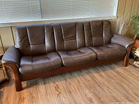 Full front view of sofa showing overall condition