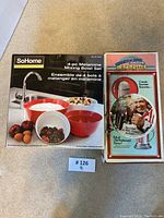Photo of boxed 4-piece SoHome melamine mixing bowl set and boxed Hamilton Beach Drink Master dispenser