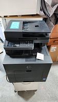 Full view of Dell C665dnf Document Hub showing document feeder, control panel, and printer base.