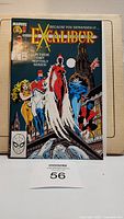 Front cover of Excalibur #1 comic book featuring group of superheroes and Marvel branding.