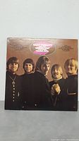 Back cover of Gary Puckett & The Union Gap 'Young Girl' album with band members photo and tracklist.
