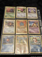 Full page of 9 Pokémon cards in plastic sleeves, including Onix, Starmie, and Jolteon.