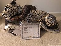 Frontal view of entire sculpture with certificate visible