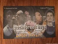 Front of a Backstreet Boys Larger Than Life pack showing 5 band members and text about collecting 72 photocards.