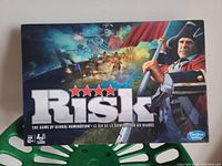Closed box of Risk The Game Of Global Domination 2010 edition by Hasbro featuring illustrated colonial/military themed artwork