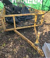 Front view showing steel frame, wood deck, tongue and hitch assembly