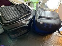 Two soft coolers side by side, showing full view of both coolers including exterior details.