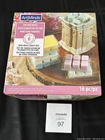 Front view of the ArtMinds Wax Melts Craft Kit box showing decorative wax melts, melting containers, and kit details
