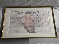 Frontal view of framed surreal lithograph showing the entire artwork, frame, and matting.