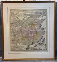 Front view of the framed vintage map, clearly showing color-highlighted provinces and overall condition of frame and matting.