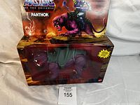 Front view of brand new vintage Panthor figure in original box with art showing Skeletor riding Panthor.