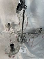 Hampton Bay light fixture showing overall structure and pink crystal accents from an upper angle