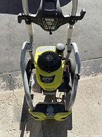 Top view of Ryobi pressure washer showing GCV 190 engine and soap tank at base.