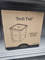 Box showing the Tech Tub lockable storage for charging devices with Copernicus branding