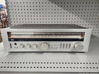 Front view of vintage Sansui Classique R-500 receiver showing tuning scale and various knobs and switches.