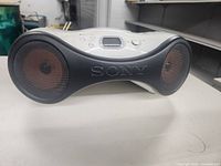 Front view of the Sony CD player showing speaker grilles and SONY branding