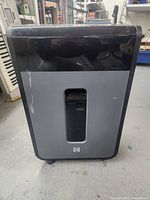 Front view of black and gray Tru Red paper shredder showing the main body and window for shredded contents.