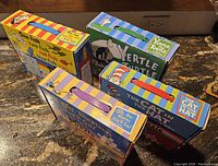 Four boxed Dr Seuss floor puzzles stacked to show brand and title: One Fish Two Fish Red Fish Blue Fish, Yertle the Turtle, The Cat in the Hat, and Oh, the Places You'll Go.