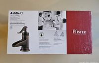 Photo of the unopened Pfister Ashfield faucet box showing product image, brand, model, and key features.