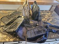 Grouped view of all six purses and bags showing variety in materials, colors, and styles