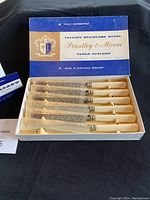 Full view of the boxed set showing 6 steak knives in original box with label on lid.