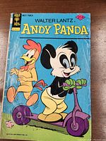 Full cover of the Andy Panda comic showing Andy Panda on a scooter with a chicken character, displaying the title, publisher Gold Key, and price 25 cents.