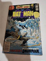 Front cover of Batman comic no. 337 showing Batman skiing with a snowy and icy backdrop, DC Comics logo, price, and issue details.