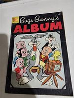 Front cover of Bugs Bunny's Album comic No. 724 featuring Bugs Bunny and other Looney Tunes characters in color illustration.