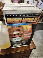 Boxed Kero World Portable Kerosene Heater showing brand, model, and product features