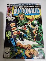 Front cover of Micronauts No.16 comic showing the main characters and title.