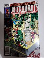 Full front cover of Micronauts comic book issue 20 showing insect-like creatures and humanoid character on cover, with title and price details.