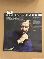 Front cover of the Richard Harris 'His Greatest Performances' LP showing his portrait and song list.